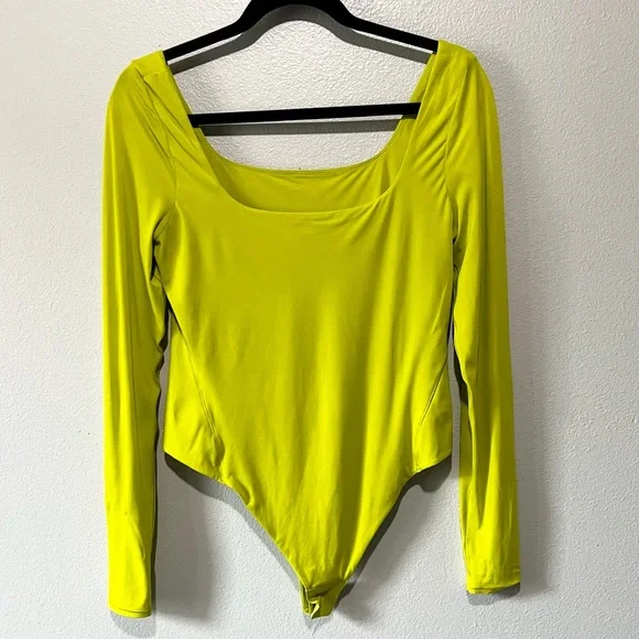 LULULEMON-NEW Bright Yellow Long Sleeve Bodysuit Size L - Picture 1 of 4